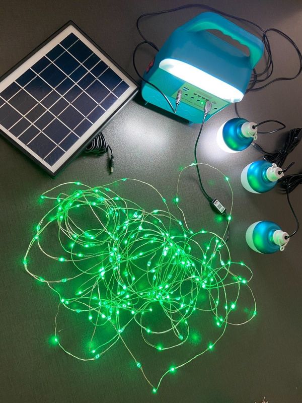 Hệ thống bảng điều khiển năng lượng mặt trời 12W 4 bóng đèn LED Bộ dụng cụ chiếu sáng năng lượng mặt trời di động