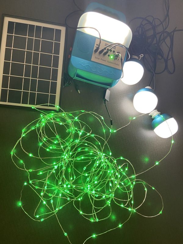 Hệ thống bảng điều khiển năng lượng mặt trời 12W 4 bóng đèn LED Bộ dụng cụ chiếu sáng năng lượng mặt trời di động
